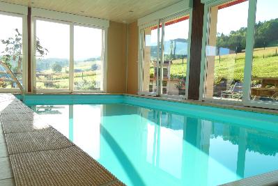 Chalet vacances avec piscine intérieure Vosges /...